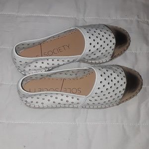 Gold and white espadrilles